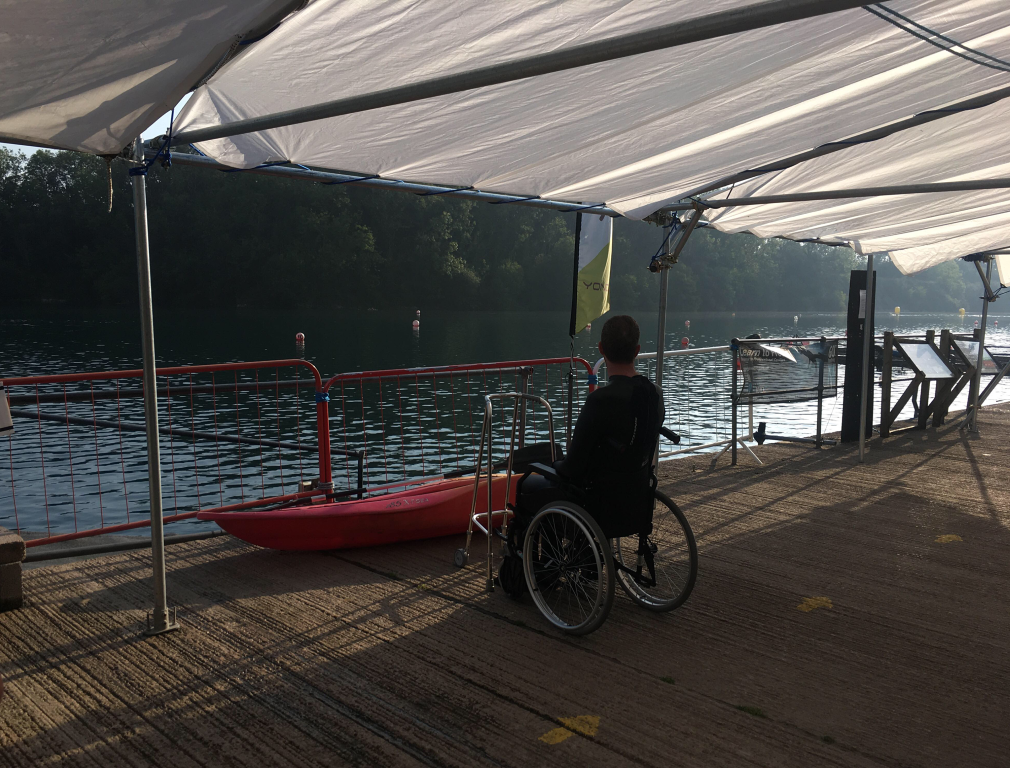 Photograph of me sitting looking out at the lake